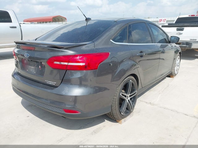 Продаж на аукціоні авто 2015 Ford Focus Titanium, vin: 1FADP3J28FL334031, номер лоту: 45796201