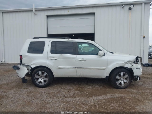 Продажа на аукционе авто 2014 Honda Pilot Touring, vin: 5FNYF4H98EB001403, номер лота: 45799101