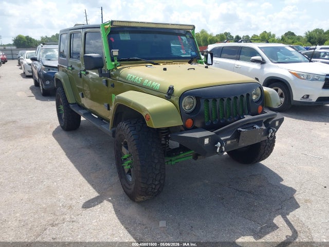 Auction sale of the 2007 Jeep Wrangler Unlimited Sahara, vin: 1J4GA59157L155747, lot number: 45801500