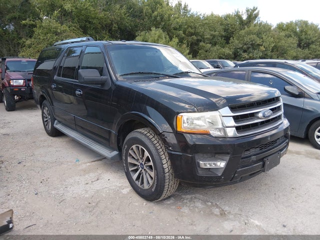 2015 1FMJK1HTXFEF25528 main image