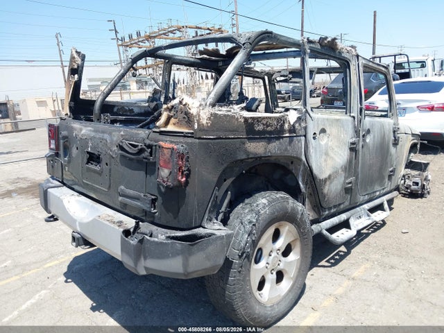 1C4HJWEG4EL141720 Jeep Wrangler Unlimited Sahara
