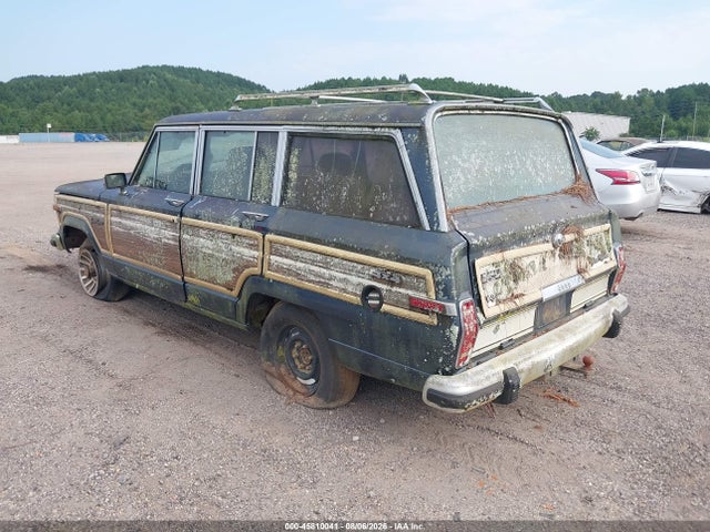 45810041 :رقم المزاد ، 1JCNJ15UXJT164567 vin ، 1988 Jeep Grand Wagoneer مزاد بيع