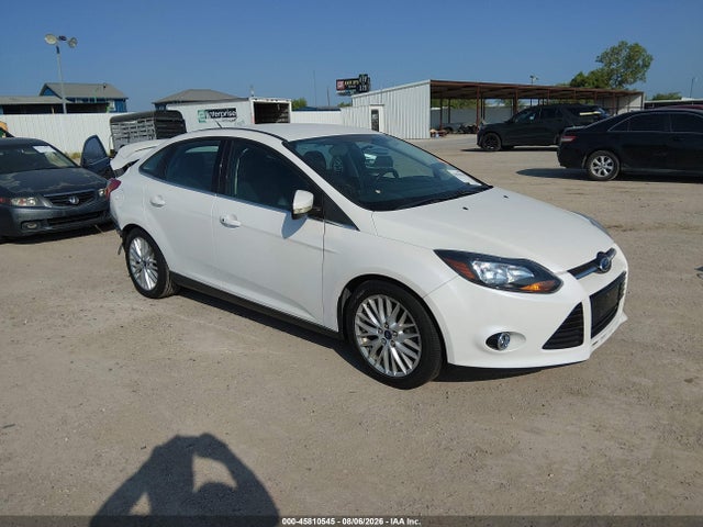 Продажа на аукционе авто 2014 Ford Focus Titanium, vin: 1FADP3J22EL257994, номер лота: 45810545
