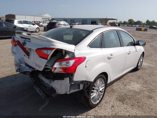 Продажа на аукционе авто 2014 Ford Focus Titanium, vin: 1FADP3J22EL257994, номер лота: 45810545