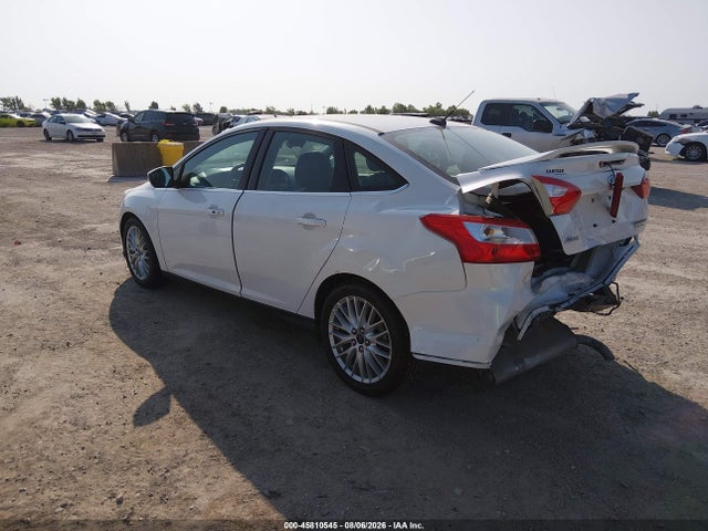 Продажа на аукционе авто 2014 Ford Focus Titanium, vin: 1FADP3J22EL257994, номер лота: 45810545