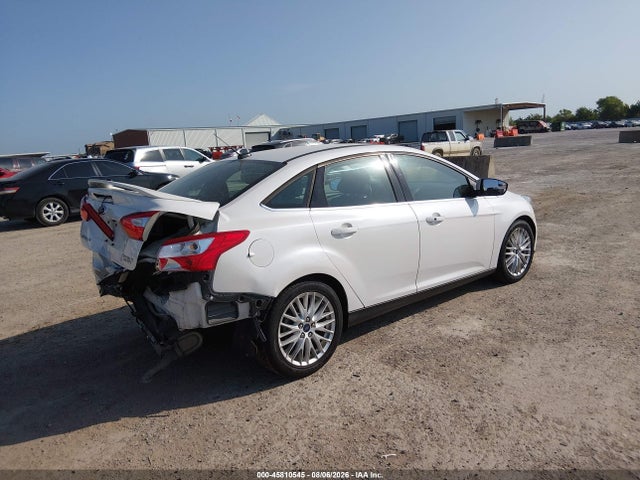 Продажа на аукционе авто 2014 Ford Focus Titanium, vin: 1FADP3J22EL257994, номер лота: 45810545