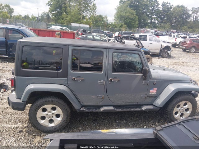 2015 Jeep Wrangler Unlimited Sahara მანქანა იყიდება აუქციონზე, vin: 1C4BJWEG9FL647048, აუქციონის ნომერი: 45829547
