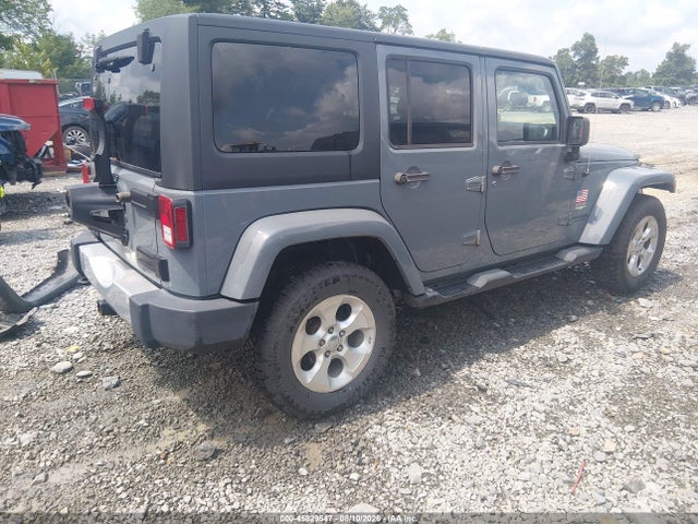 2015 Jeep Wrangler Unlimited Sahara მანქანა იყიდება აუქციონზე, vin: 1C4BJWEG9FL647048, აუქციონის ნომერი: 45829547