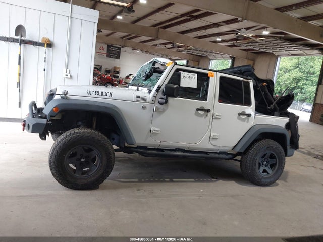 2015 Jeep Wrangler Unlimited Willys Wheeler მანქანა იყიდება აუქციონზე, vin: 1C4BJWDG7FL617371, აუქციონის ნომერი: 45855031
