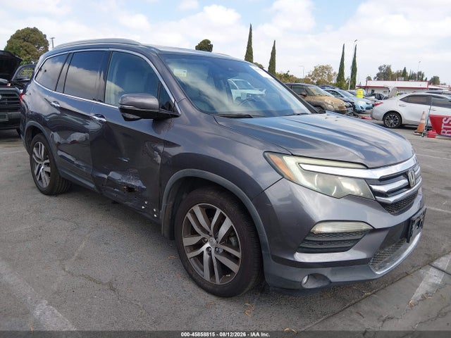 Продажа на аукционе авто 2017 Honda Pilot Touring, vin: 5FNYF5H94HB011677, номер лота: 45858815