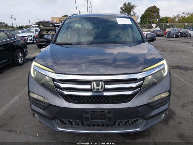 Продажа на аукционе авто 2017 Honda Pilot Touring, vin: 5FNYF5H94HB011677, номер лота: 45858815