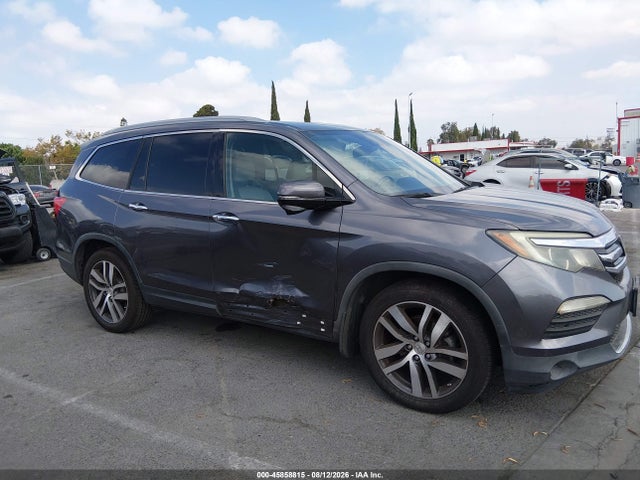 Продажа на аукционе авто 2017 Honda Pilot Touring, vin: 5FNYF5H94HB011677, номер лота: 45858815