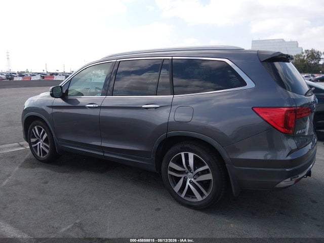 Продажа на аукционе авто 2017 Honda Pilot Touring, vin: 5FNYF5H94HB011677, номер лота: 45858815