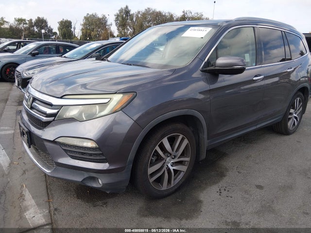 Продажа на аукционе авто 2017 Honda Pilot Touring, vin: 5FNYF5H94HB011677, номер лота: 45858815