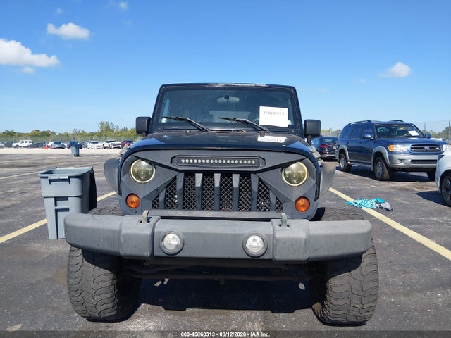 45860313 :رقم المزاد ، 1J4BB3H16AL163411 vin ، 2010 Jeep Wrangler Unlimited Sport مزاد بيع