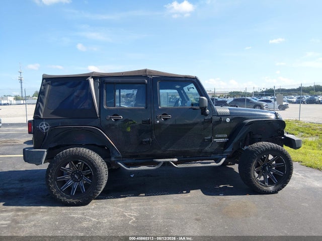45860313 :رقم المزاد ، 1J4BB3H16AL163411 vin ، 2010 Jeep Wrangler Unlimited Sport مزاد بيع