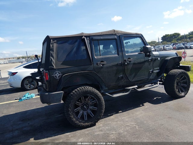 45860313 :رقم المزاد ، 1J4BB3H16AL163411 vin ، 2010 Jeep Wrangler Unlimited Sport مزاد بيع