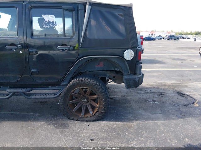 45860313 :رقم المزاد ، 1J4BB3H16AL163411 vin ، 2010 Jeep Wrangler Unlimited Sport مزاد بيع