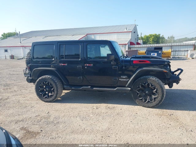 45862103 :رقم المزاد ، 1J4BA5H15BL557093 vin ، 2011 Jeep Wrangler Unlimited Sahara مزاد بيع