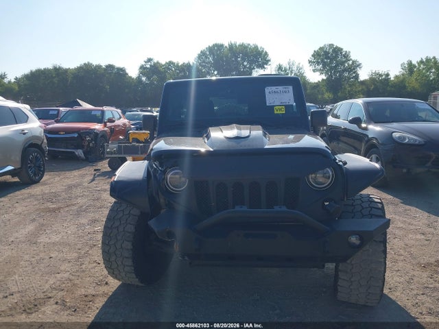 45862103 :رقم المزاد ، 1J4BA5H15BL557093 vin ، 2011 Jeep Wrangler Unlimited Sahara مزاد بيع