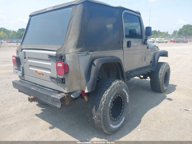 45866002 :رقم المزاد ، 1J4FA49S71P335956 vin ، 2001 Jeep Wrangler Sport مزاد بيع