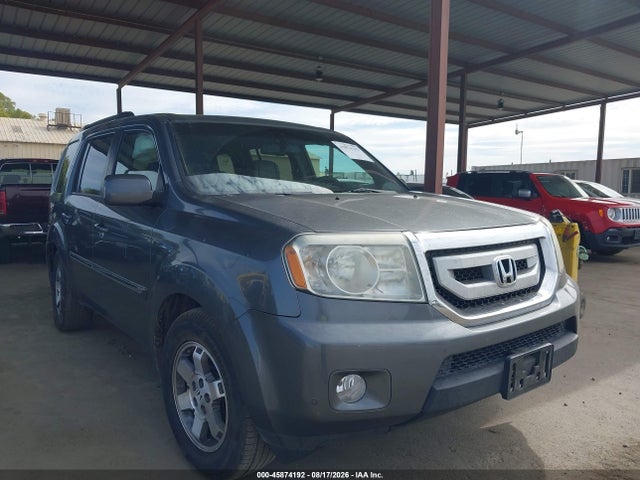 Продажа на аукционе авто 2011 Honda Pilot Touring, vin: 5FNYF4H99BB001907, номер лота: 45874192