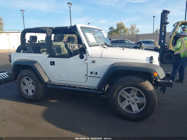 45900716 :رقم المزاد ، 1J4FA24169L722763 vin ، 2009 Jeep Wrangler X مزاد بيع