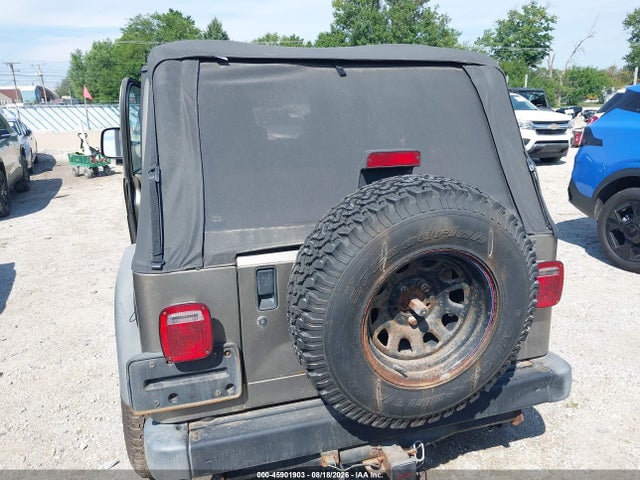 45901903 :رقم المزاد ، 1J4FA49S64P724088 vin ، 2004 Jeep Wrangler Sport مزاد بيع