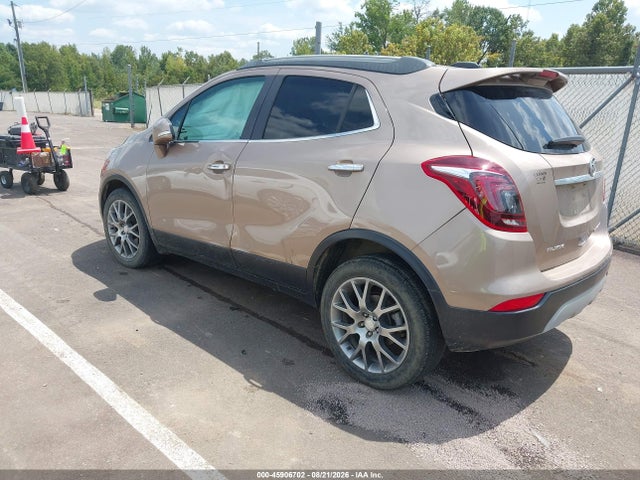 45906702 :رقم المزاد ، KL4CJ1SB9JB617296 vin ، 2018 Buick Encore Sport Touring مزاد بيع