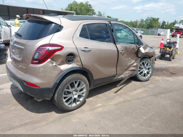 45906702 :رقم المزاد ، KL4CJ1SB9JB617296 vin ، 2018 Buick Encore Sport Touring مزاد بيع