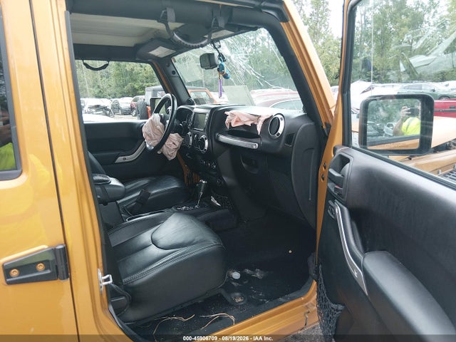 2014 Jeep Wrangler Unlimited Sahara მანქანა იყიდება აუქციონზე, vin: 1C4BJWEG9EL247425, აუქციონის ნომერი: 45906709