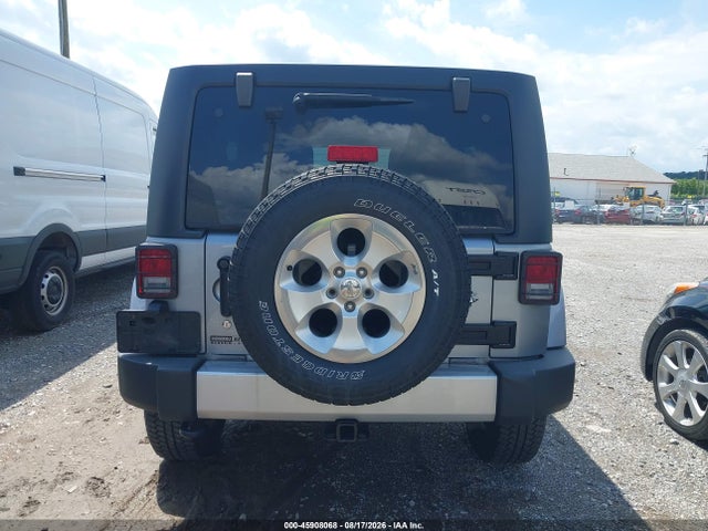 2015 Jeep Wrangler Unlimited Sahara მანქანა იყიდება აუქციონზე, vin: 1C4BJWEG7FL700409, აუქციონის ნომერი: 45908068