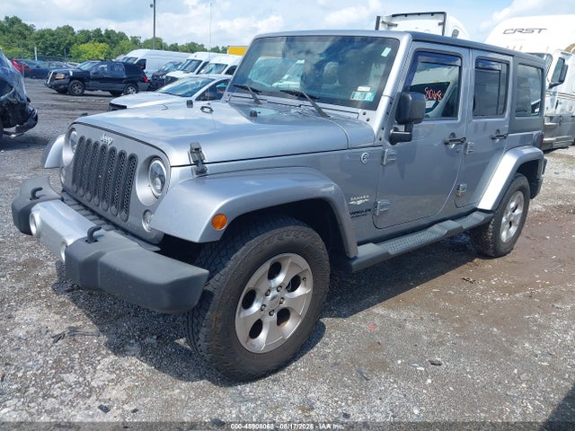2015 Jeep Wrangler Unlimited Sahara მანქანა იყიდება აუქციონზე, vin: 1C4BJWEG7FL700409, აუქციონის ნომერი: 45908068