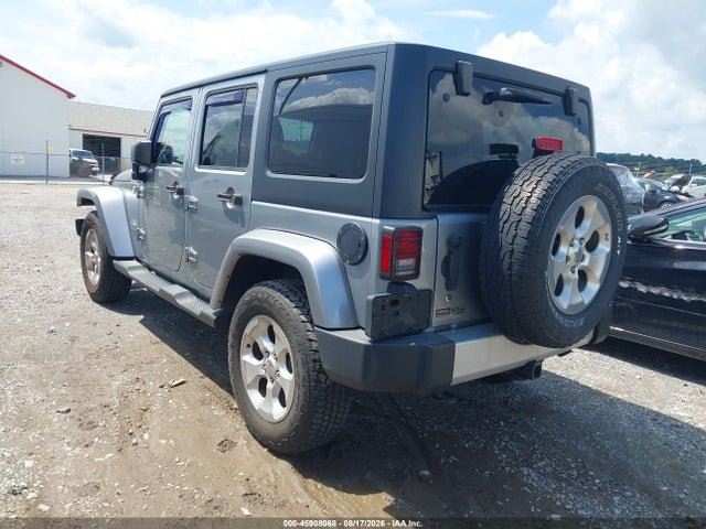 2015 Jeep Wrangler Unlimited Sahara მანქანა იყიდება აუქციონზე, vin: 1C4BJWEG7FL700409, აუქციონის ნომერი: 45908068