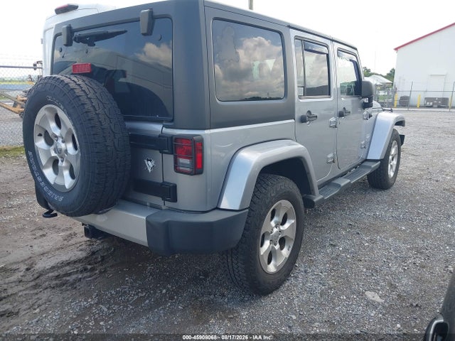2015 Jeep Wrangler Unlimited Sahara მანქანა იყიდება აუქციონზე, vin: 1C4BJWEG7FL700409, აუქციონის ნომერი: 45908068