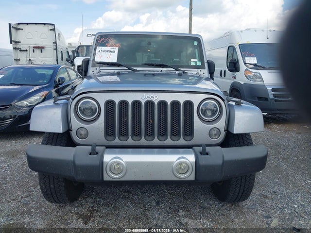 2015 Jeep Wrangler Unlimited Sahara მანქანა იყიდება აუქციონზე, vin: 1C4BJWEG7FL700409, აუქციონის ნომერი: 45908068