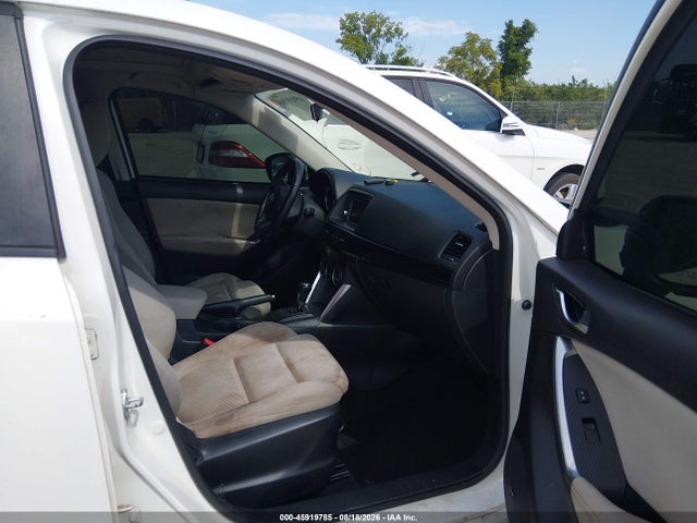2014 Mazda Cx-5 Touring მანქანა იყიდება აუქციონზე, vin: JM3KE2CY9E0318592, აუქციონის ნომერი: 45919785