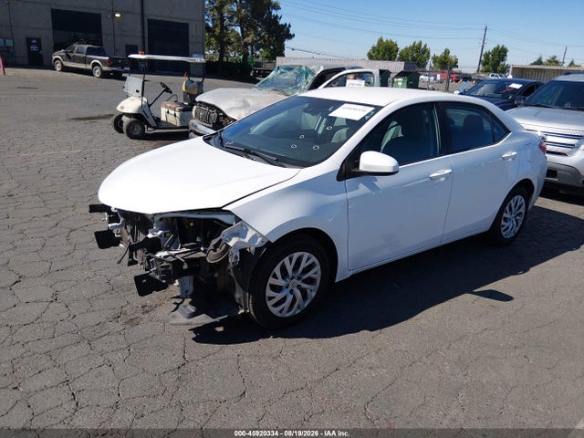 2T1BURHE5JC022472 Toyota COROLLA LE
