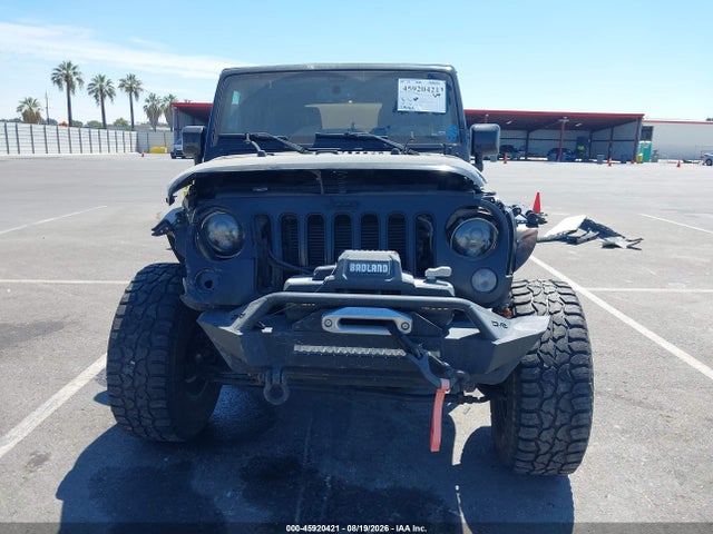 1C4BJWEG9EL324679 Jeep Wrangler Unlimited Altitude