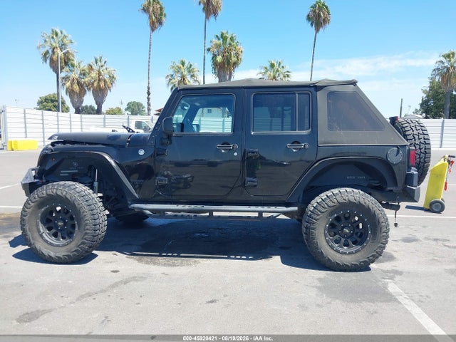 1C4BJWEG9EL324679 Jeep Wrangler Unlimited Altitude