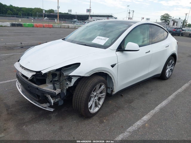 2021 Tesla Model Y Long Range Dual Motor All-wheel Drive მანქანა იყიდება აუქციონზე, vin: 5YJYGAEE0MF189197, აუქციონის ნომერი: 45926255