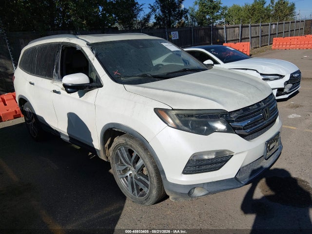Продаж на аукціоні авто 2016 Honda Pilot Touring, vin: 5FNYF5H99GB051395, номер лоту: 45933405