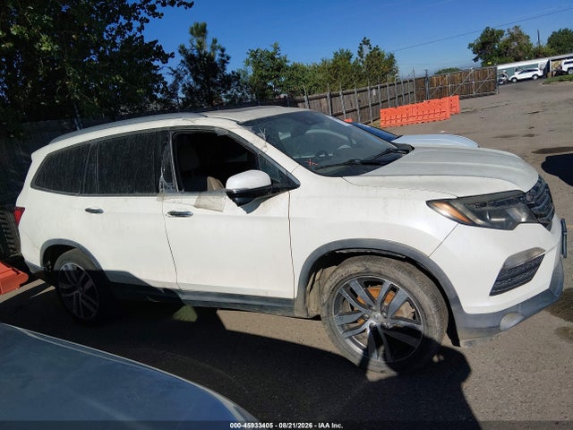 Продажа на аукционе авто 2016 Honda Pilot Touring, vin: 5FNYF5H99GB051395, номер лота: 45933405