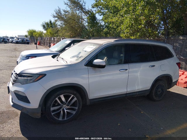 Продажа на аукционе авто 2016 Honda Pilot Touring, vin: 5FNYF5H99GB051395, номер лота: 45933405