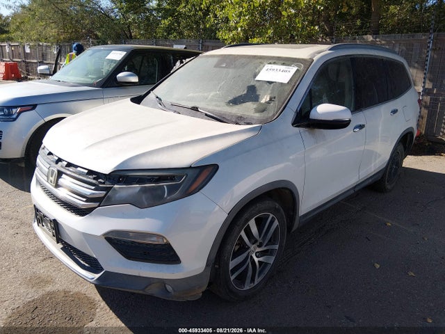 Продажа на аукционе авто 2016 Honda Pilot Touring, vin: 5FNYF5H99GB051395, номер лота: 45933405