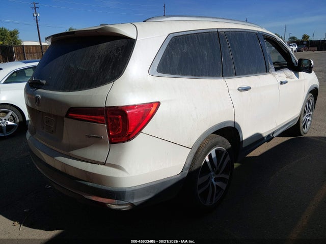 Продажа на аукционе авто 2016 Honda Pilot Touring, vin: 5FNYF5H99GB051395, номер лота: 45933405