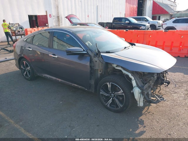 2017 Honda Civic Touring მანქანა იყიდება აუქციონზე, vin: 2HGFC1F94HH642260, აუქციონის ნომერი: 45934335