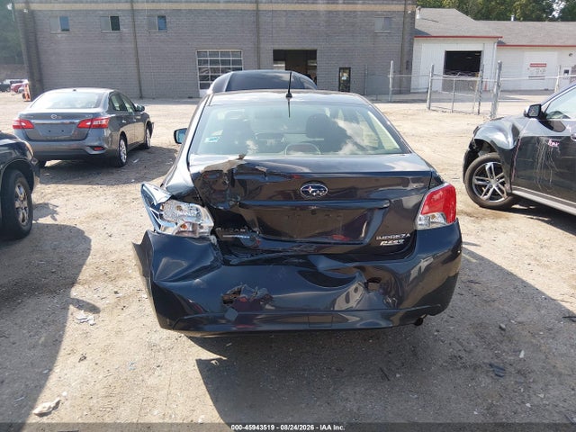 JF1GJAA64EH023543 Subaru Impreza 2.0i