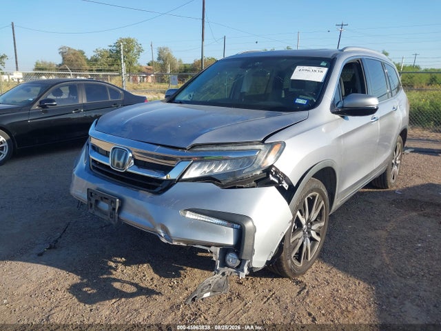 45963838 :رقم المزاد ، 5FNYF5H63LB025228 vin ، 2020 Honda Pilot 2wd Touring 7 Passenger مزاد بيع