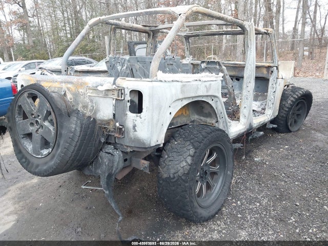 2007 Jeep Wrangler Unlimited Sahara მანქანა იყიდება აუქციონზე, vin: 1J4GA591X7L137910, აუქციონის ნომერი: 45973593
